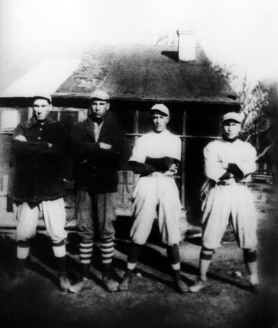 Cecil, second from left, and his brothers dressed to play baseball in Irwindale in the 1920's | Shades of L.A. Collection, Los Angeles Public Library