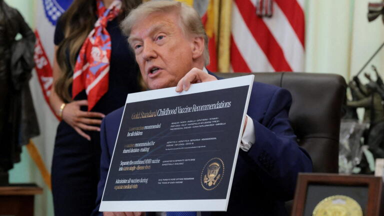News Wrap: Trump signs order on childhood vaccines
