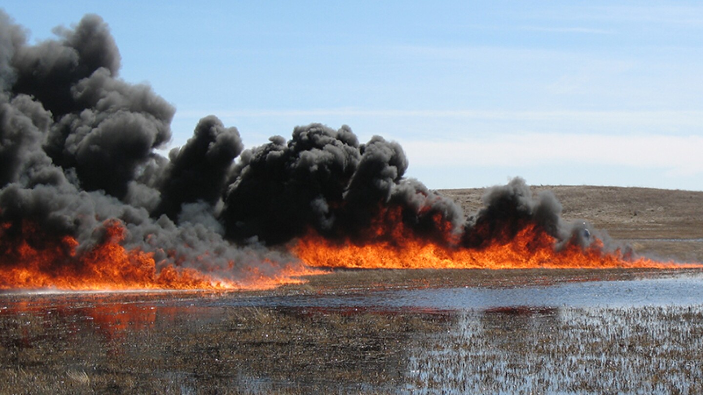 Just another day in North Dakota: an oil spill burns in a wildlife refuge in 2010 | Photo: USFWS