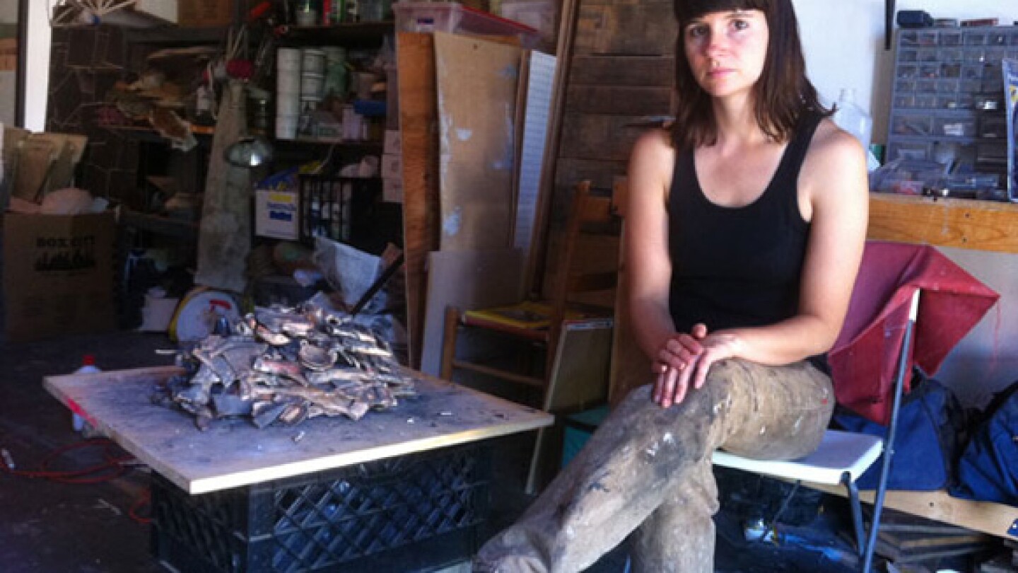 Liz Glynn in her studio with her ceramic copy (in progress) of the Salisbury Hoard | Photo: Sharon Mizota.