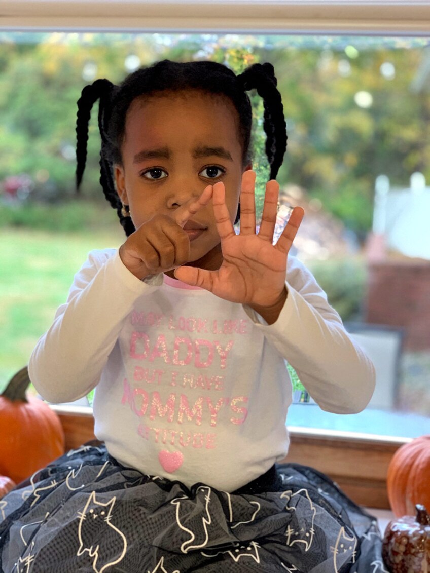 SarahEllen, the author's daughter, practices five finger breathing.