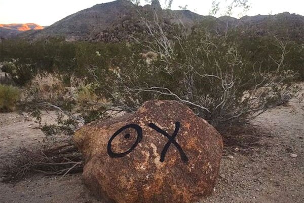 The vandalized rock