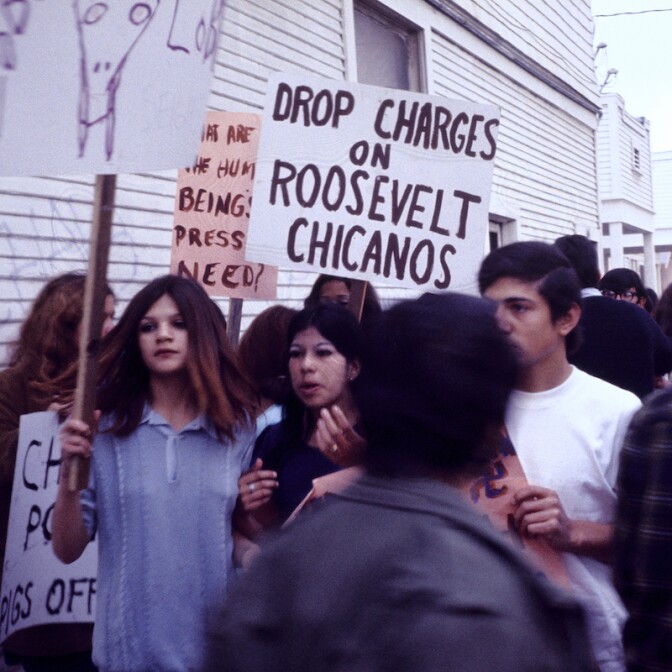Oscar Castillo, "Drop Charges on Roosevelt Chicanos (Roosevelt High School Walkouts)," 1970, black and white photograph. | Photo: Courtesy of the artist
