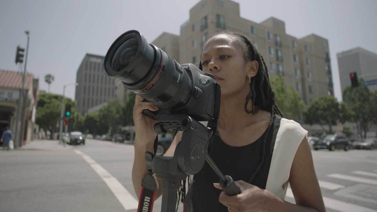 Janna Ireland taking a photo of a Paul R. Williams work | Still from "Lost LA" Paul R. Williams