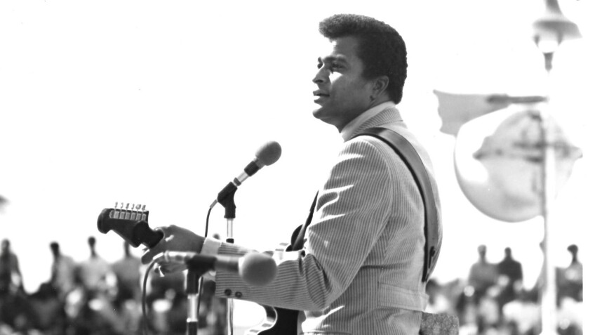 Photo of Charley Pride performing.