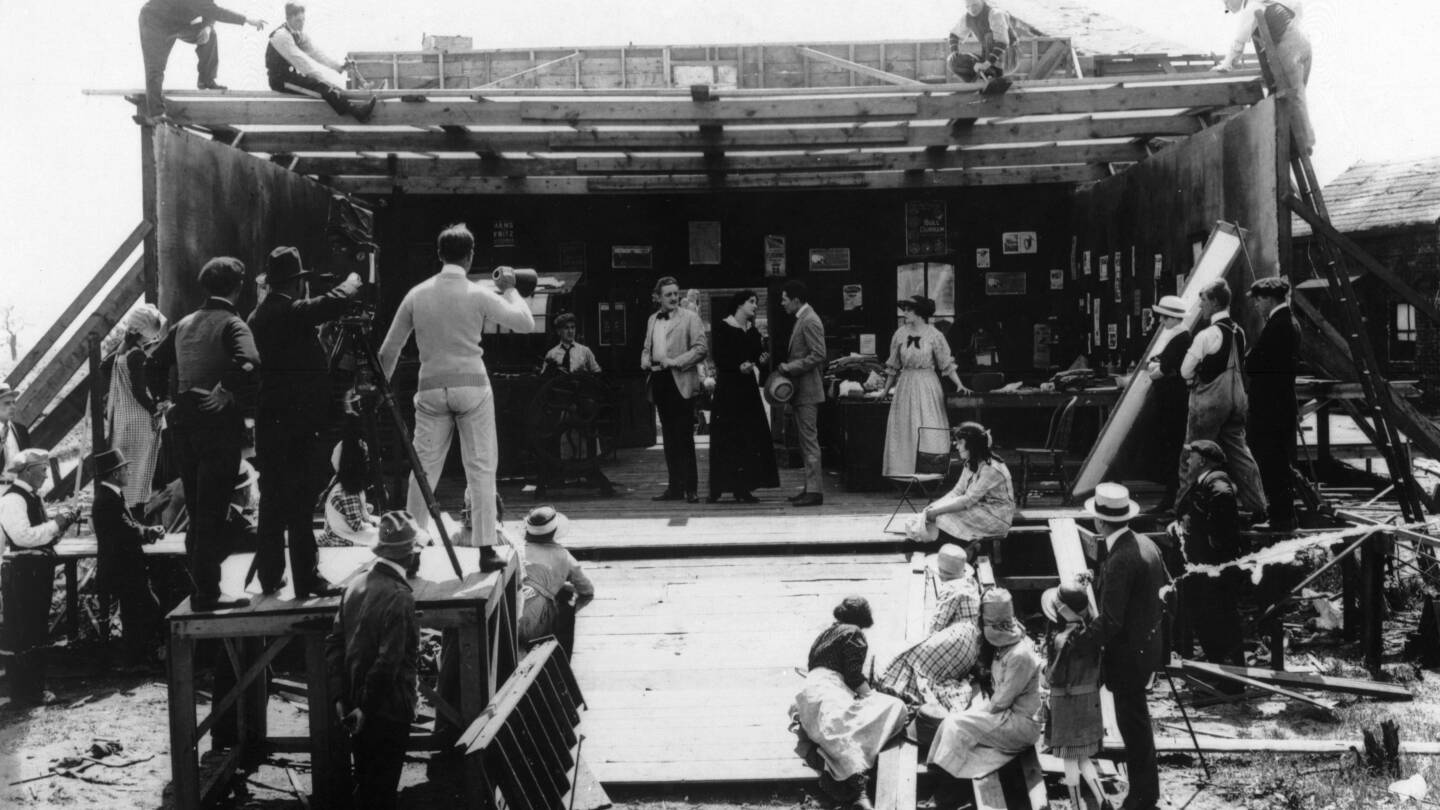 View of an outdoor film set at Vitagraph Studios, showing a film shoot in progress, 1917