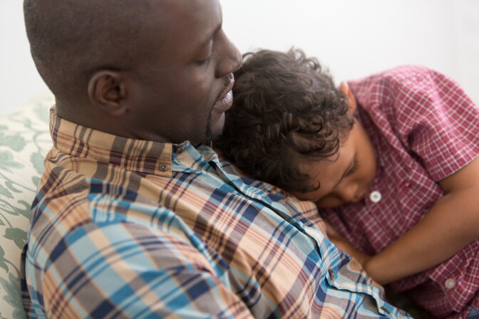 Father Comforting Upset Son