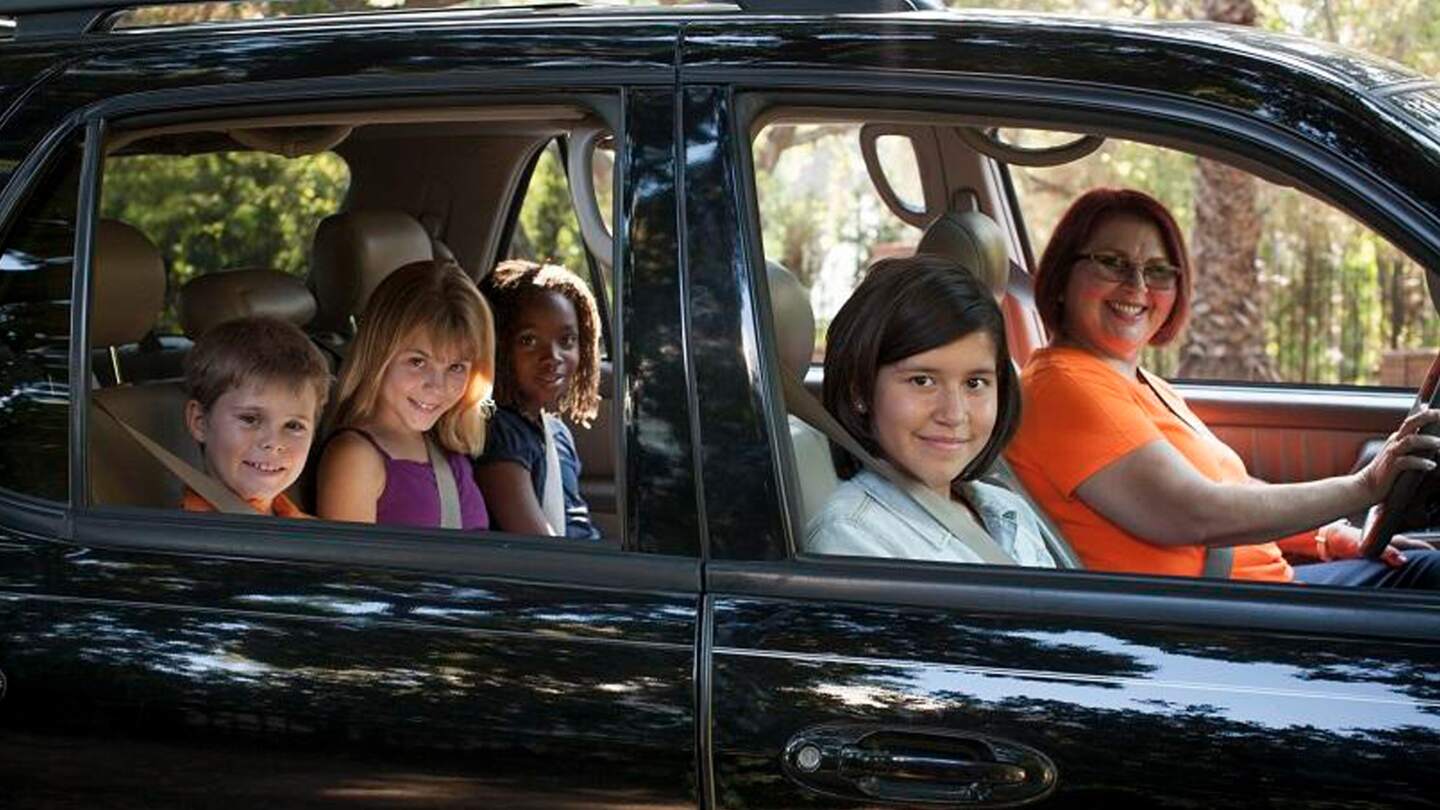 Hop Skip Drive car full of youth and driver