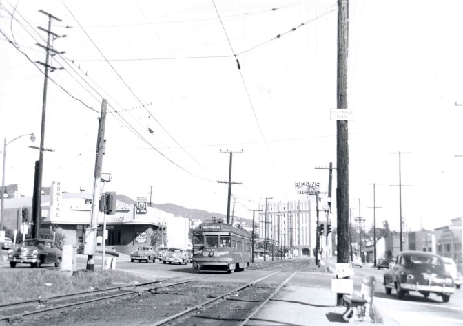 Electric railway tracks once ran down the median of Santa Monica Boulevard, shown here in West Hollywood in 1951. Courtesy of the Metro Transportation Library and Archive.