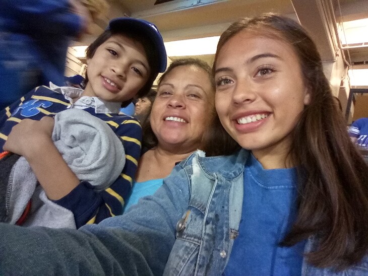 Rina Chavarria, center, with her 12-year-old son and 20-year-old daughter. Chavarria contracted COVID-19 in late April. Co-workers and neighbors have gotten sick, too. | Courtesy Rina Chavarria/UFCW770