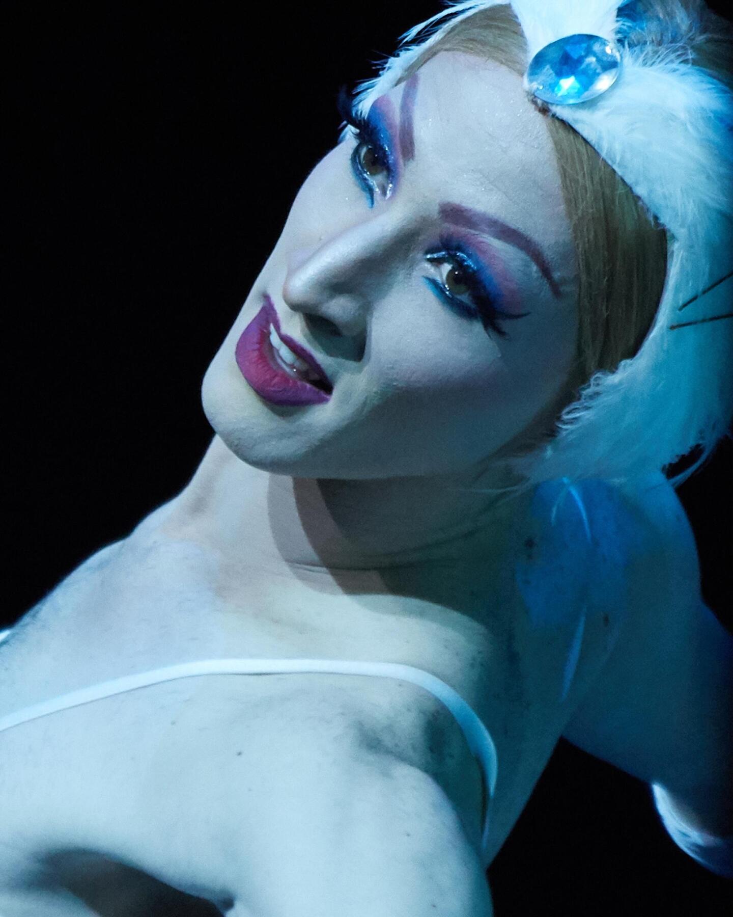 A male ballerina in the middle of a performance.