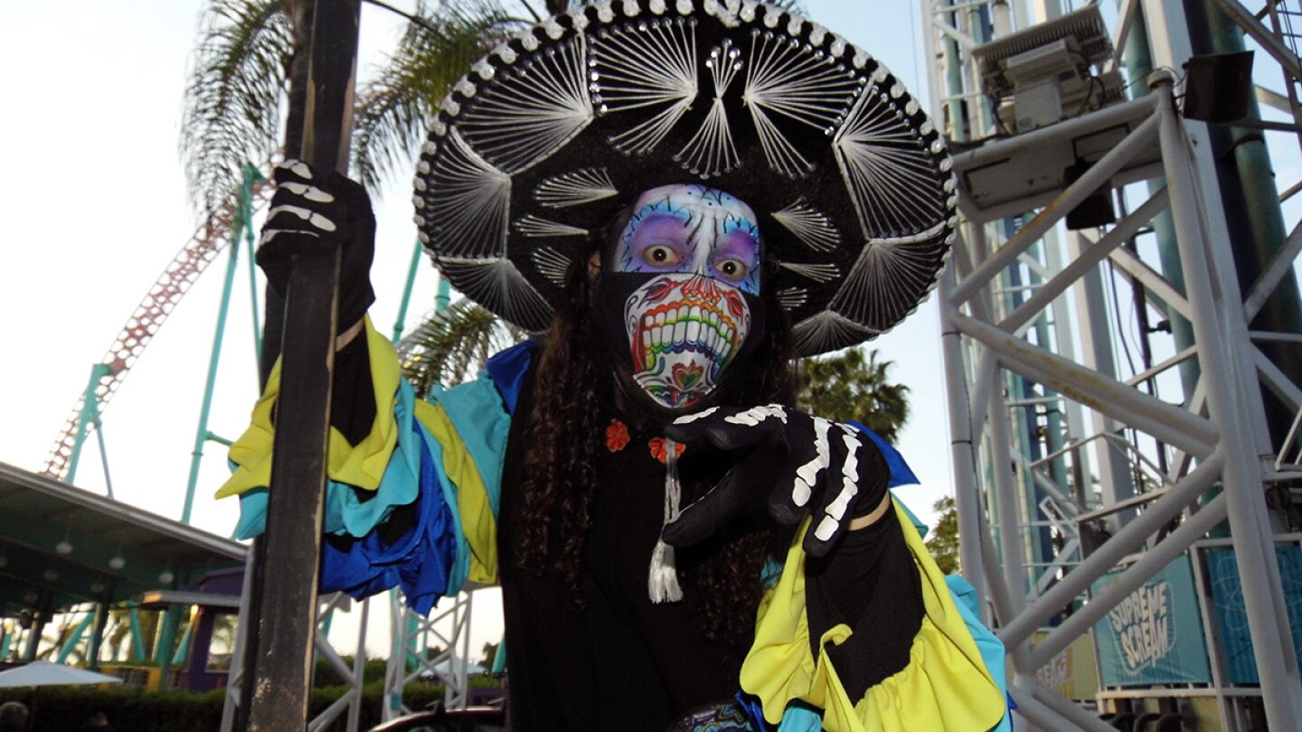 A stilt-walker poses at Knott's Taste of Fall-O-Ween. | Sandi Hemmerlein