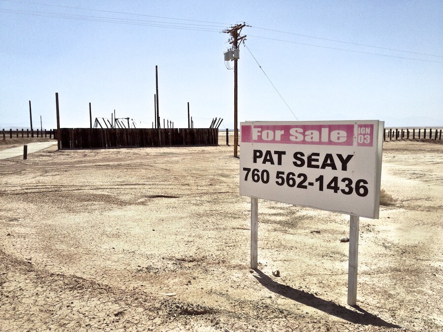 "Desert Ruin with For Sale Sign." Salton Sea, CA. 2014. | Photo: Osceola Refetoff.