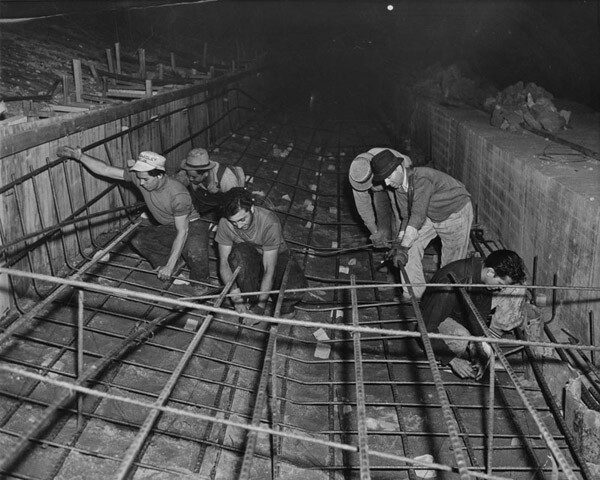 Men laying rebar in the channel, 1938. Courtesy of the Los Angeles Public Library.