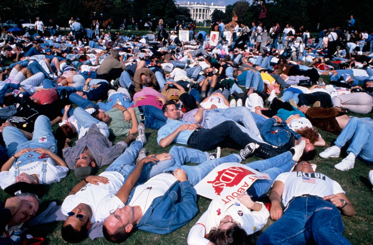 AIDS protest in front of the White House. ACT UP activists stage a die-in on the lawn in front of the Capitol building. | Photo: Jeffrey Markowitz/Sygma via Getty Images