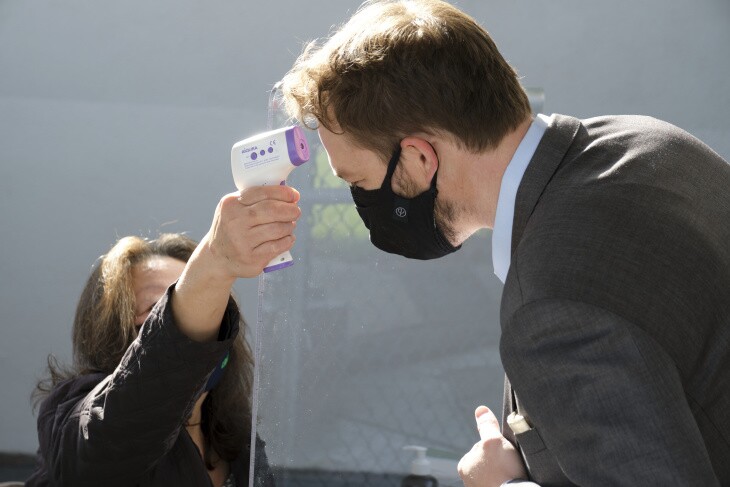 L.A. Unified School Board member Nick Melvoin has his temperature checked before a campus tour at Walgrove Avenue Elementary School on March 17, 2021.