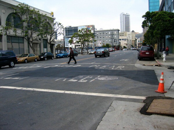 Street cuts, seen here in San Francisco, can often be identified as square or rectangular excavations made by workers to access below city streets