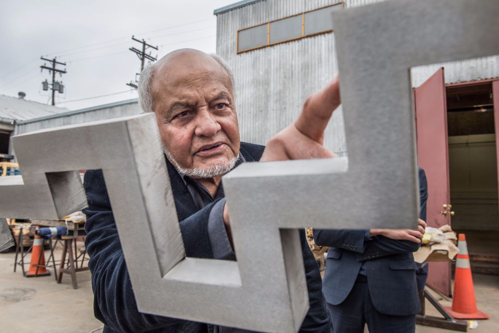 Artist Cecil Balmond works to install a part of the Freedom Sculpture | Courtesy of Farhang Foundation