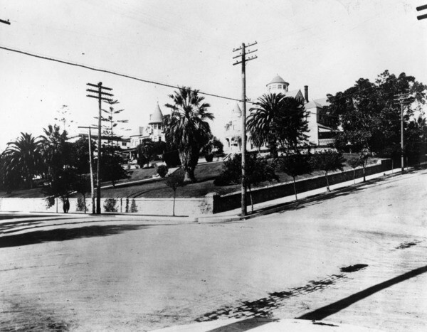 Wilshire Boulevard at Lucas Avenue, ca. 1905. The roads are still unpaved | Security Pacific National Bank Collection, Courtesy of the Los Angeles Public Library