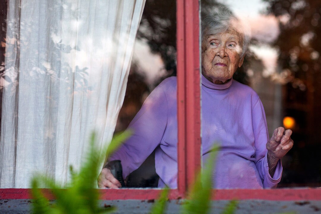Photographer Sally Ryan snapped pictures of her neighbors with a window separating the camera from the people to symbolize social distancing. | Photographs by Sally Ryan and submitted to the Autry.