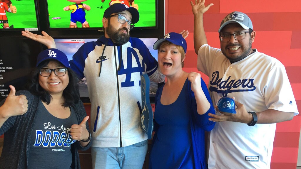 Employees of PBS and KCET celebrating Dodgers opening day