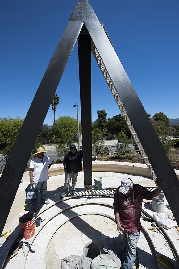Workers put the finishing touches on the new 'Armenian Genocide Memorial' in Pasadena, California on April 17, 2015, before the official unveiling and dedication ceremony the following day. | ROBYN BECK/AFP/Getty Images