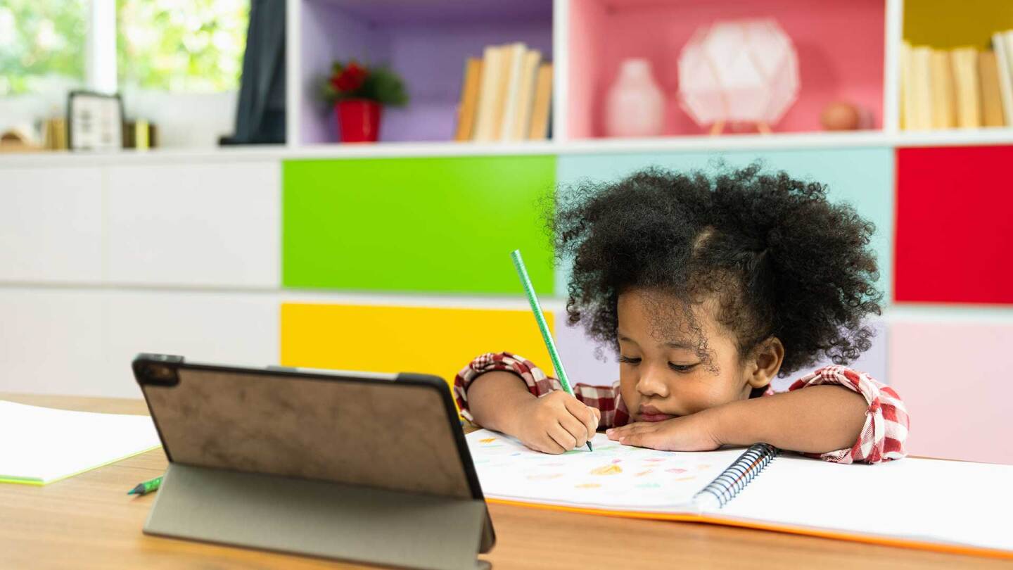 child on ipad, istock