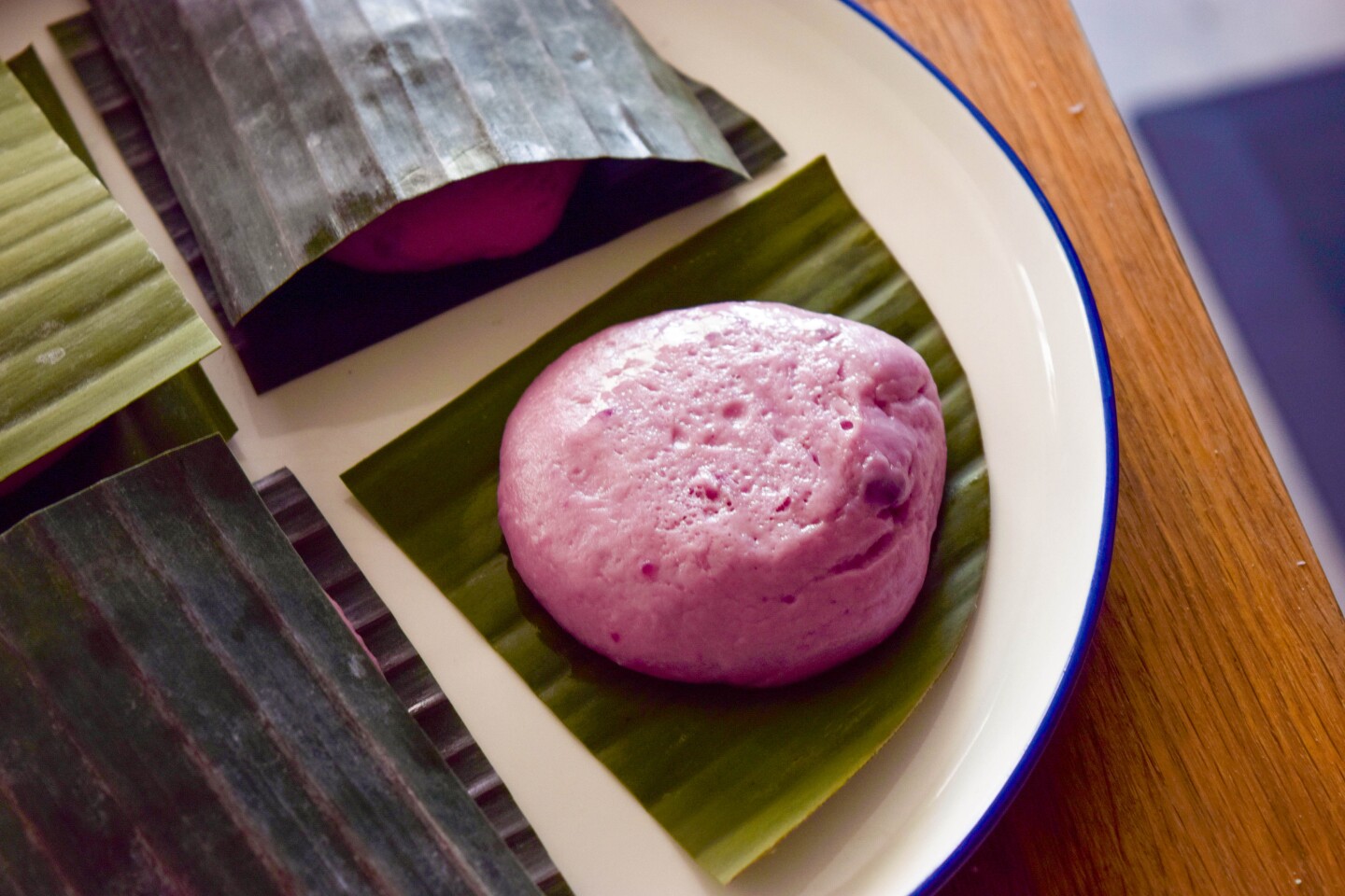 A pink Teochew cake bun made for special occasions like Lunar New Year and weddings.