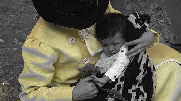 Nao Bustamante, film still from "Soldadera," 2015. 6Â minute video loop with audio. Speculative reenactment video montage with archival photography.