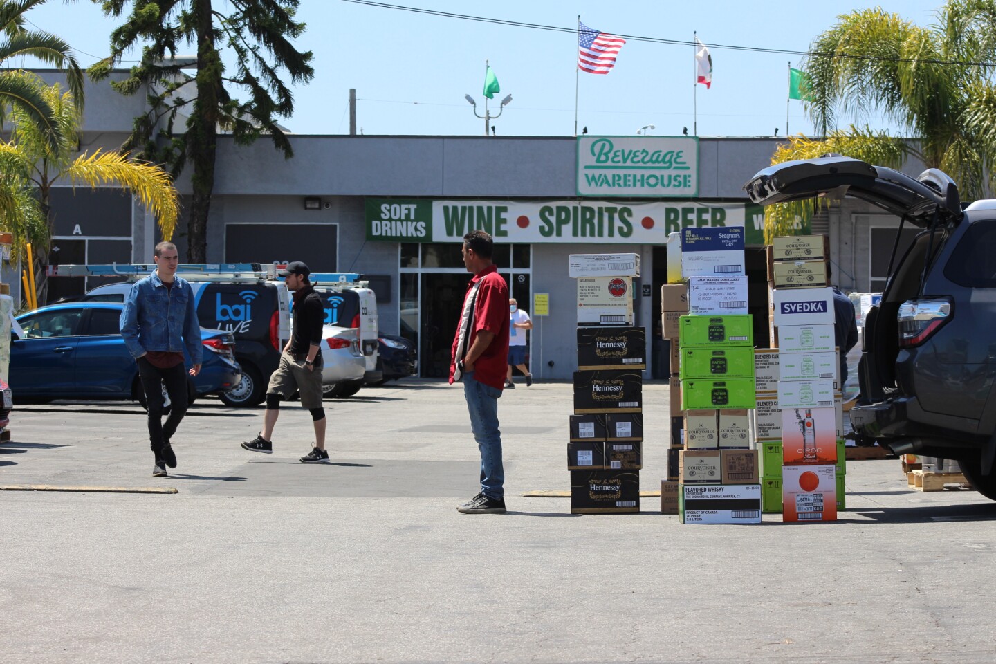 Parking lot of Beverage Warehouse, where shipments of alcohol have just come in | Karen Foshay