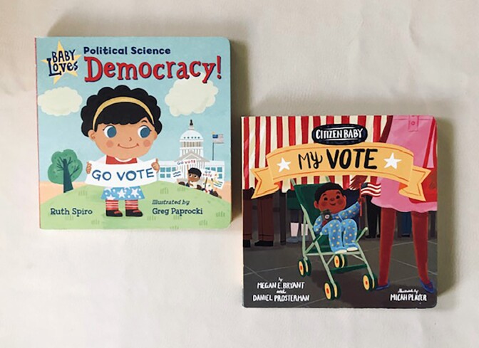 Book covers of “Baby Loves Political Science: Democracy!” featuring a small child cartoon holding a sign that reads "go vote" and of “Citizen Baby: My Vote” featuring a cartoon baby in a stroller.