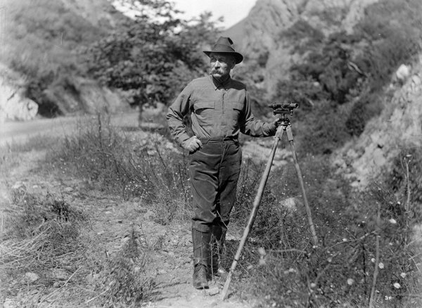 William Mulholland, taken in the field with a surveying instrument. Historical Photo Collection of the Department of Water and Power, City of Los Angeles