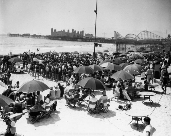 1930 beach party, with Santa Monica Pier in the background | Courtesy of the Los Angeles Public Library