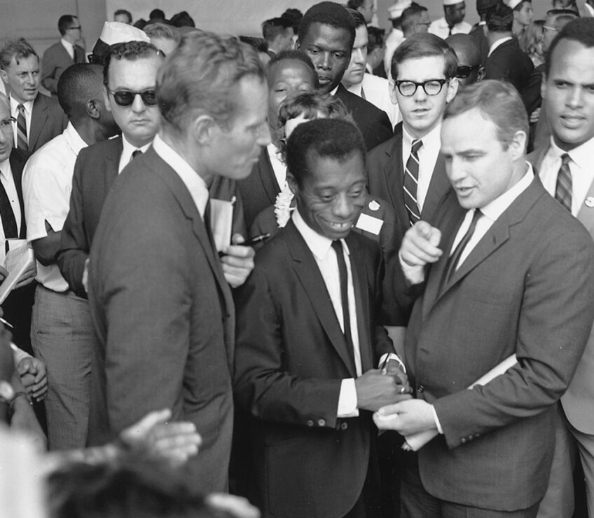 L-R Charlton Heston, James Baldwin, and Marlon Brando at the March on Washington