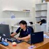 Leo Wong tries to navigate the web looking for information on SBA loans. | Photo courtesy of Leo Wong
