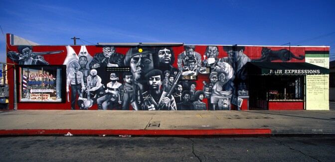 Noni Olabisi, “To Protect and Serve” (painted in 1993, restored in 2015), located at 3406 11th Avenue, Los Angeles (image courtesy SPARC Archives).jpg