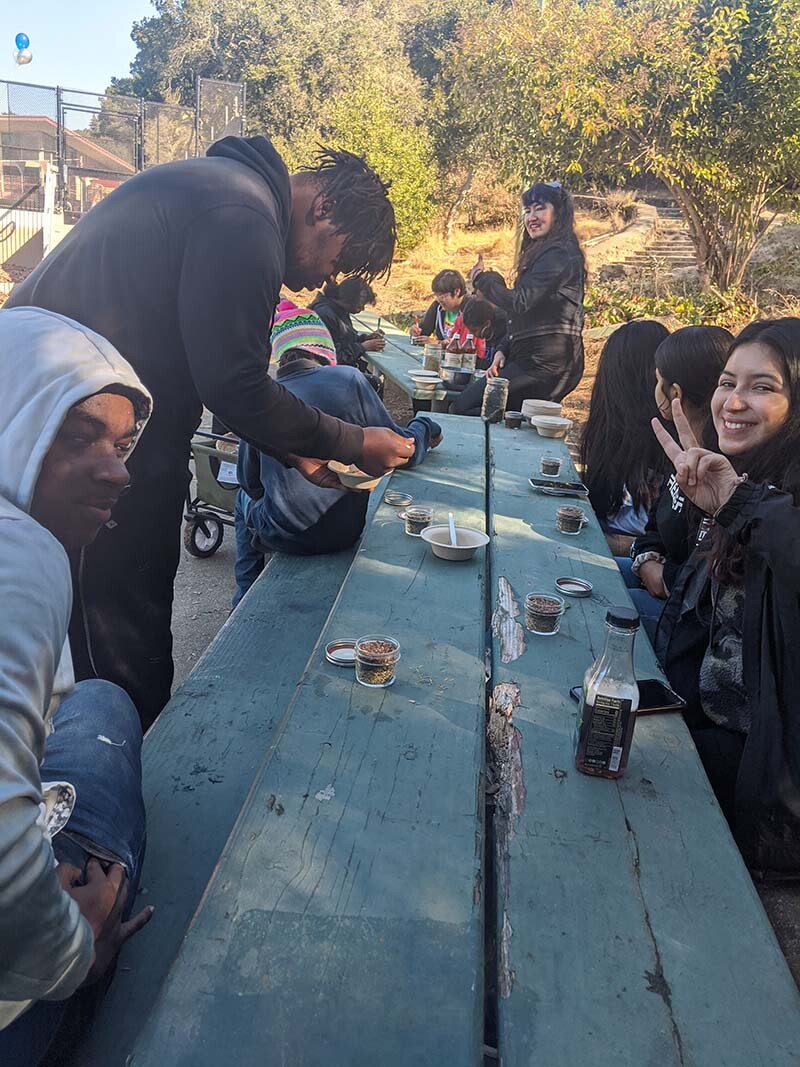 Californians for Justice leaders in a workshop learning about healing remedies of plants and herbs. | Californians for Justice