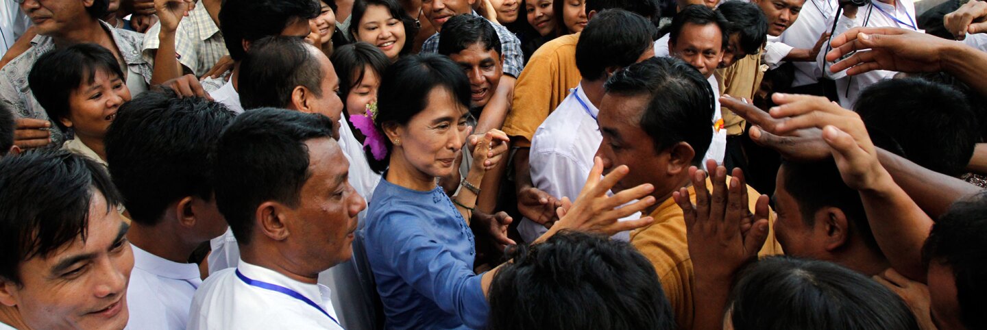 Aung San Suu Kyi Greeting Supporters
