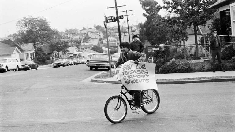 Boy on a bicycle | Debra Weber, Courtesy of UCLA Chicano Studies Research Center La Raza AB s9