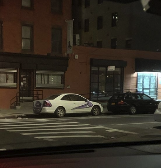 A white sedan bombed by Kenny Scharf for his "Karbombz!" project | Courtesy of the artist
