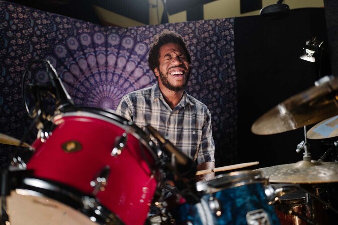 Mekala Session, leader of the Pan Afrikan Peoples Arkestra, playing drums | Samantha Lee ab s11