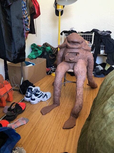 Carlin Faucett's unfired clay art slumps on a chair