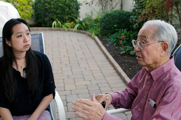 Writer Victoria Moy (left), converses with World War II veteran Dr. Wing Mar (right). His accounts of his military service are documented in Moy's new book on Chinese American veterans. | Photo: Elson Trinidad