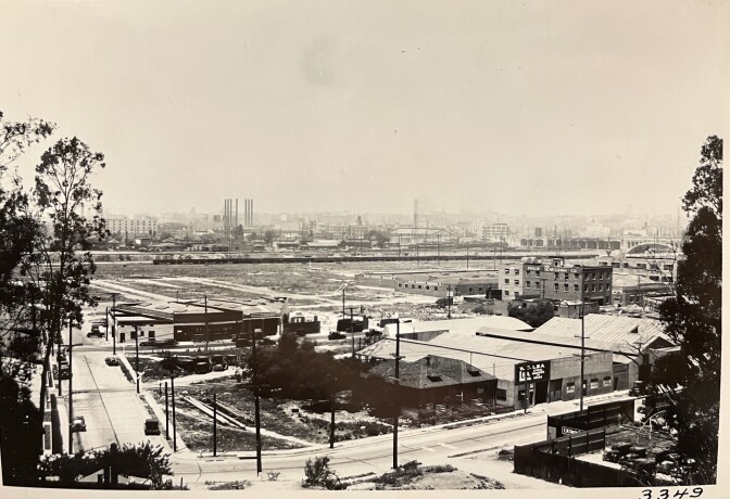 Photographed from the bridge's abutment on the east side, this photo shows the flats of Boyle Heights while looking west across the river.