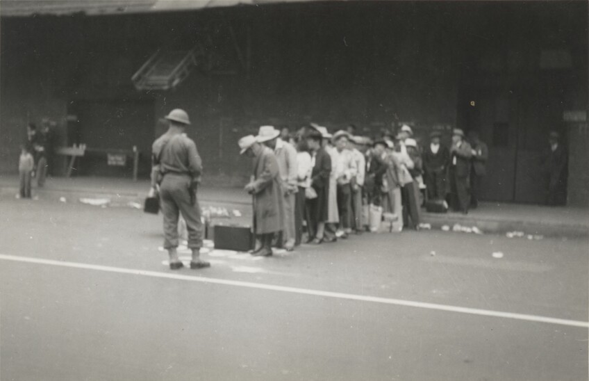 JANM-Japanese Americans lined up and under guard on central avenue.jpg