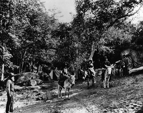 Commodore Perry Switzer, on left with guests in the Arroyo Seco, circa 1885. | Courtesy of the Los Angeles Public Library