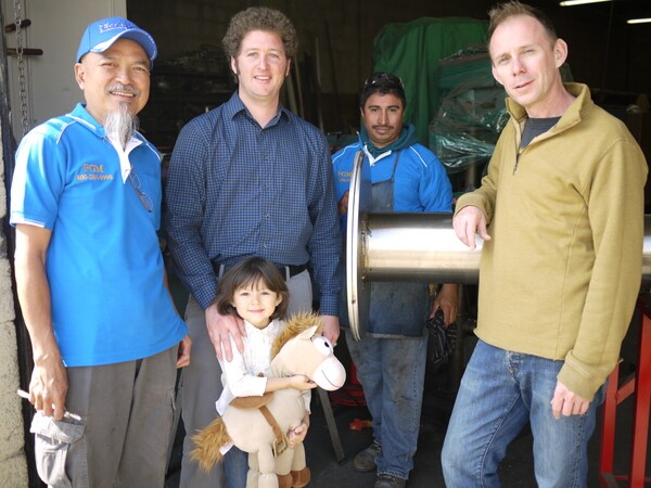Street pole fabricators Noy Lee and Jeremy Ochoa with Thai CDC staff Curtis McElhinney, Tyler Forester, and daughter Zoë Forester--George Villanueva