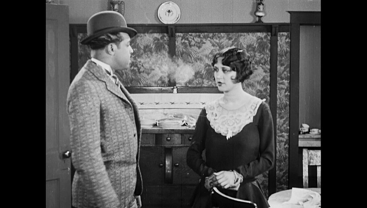 Lucia Lynn Moses as Louise and Norman Johnstone as Eddie Blake in "The Scar of Shame" (1929). USA. Directed by Frank Perugini | Courtesy of the California African American Museum