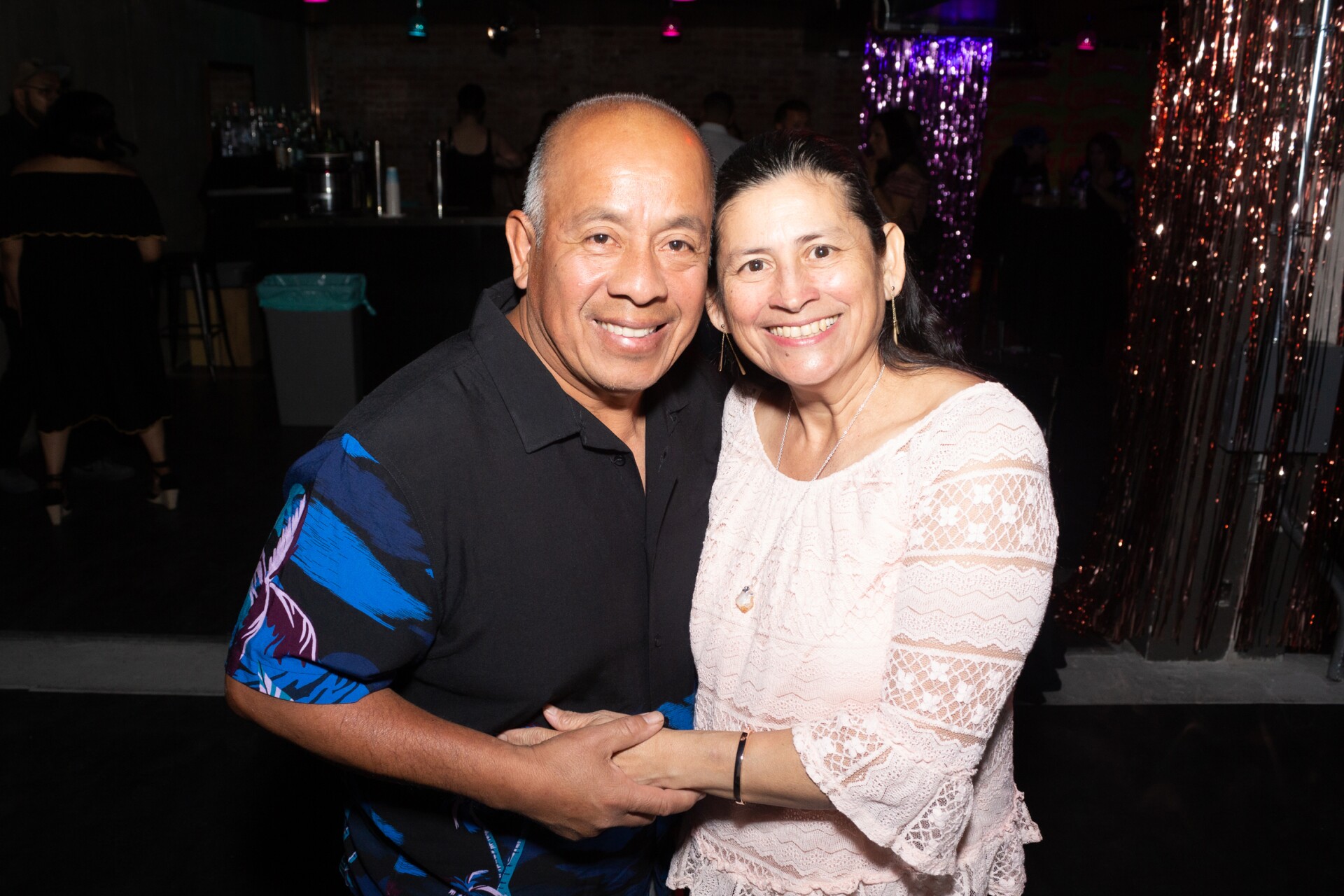 An older gentelman and lady at a Cumbiatón party.