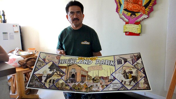 Rodolfo Cardona with his 'Historic Highland Park' painting